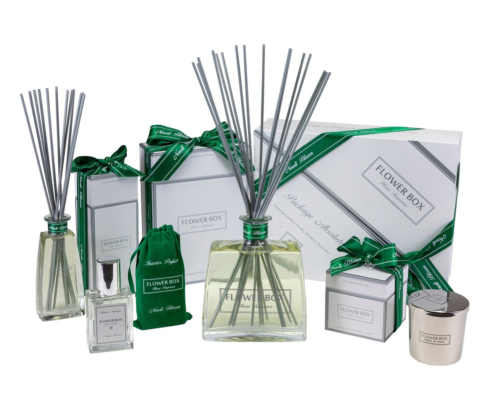 Set of diffusers, candles, and boxes with 'Flower Box' branding on a white background