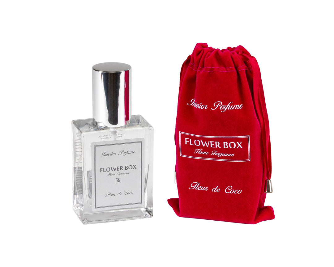 Interior perfume spray bottle with silver cap and red drawstring bag labeled 'Flower Box' on a white background