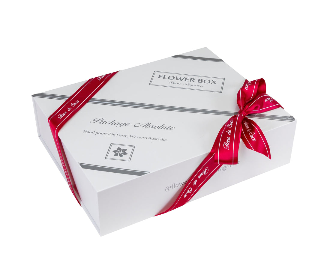 Flower Box gift package with red ribbon on a white background